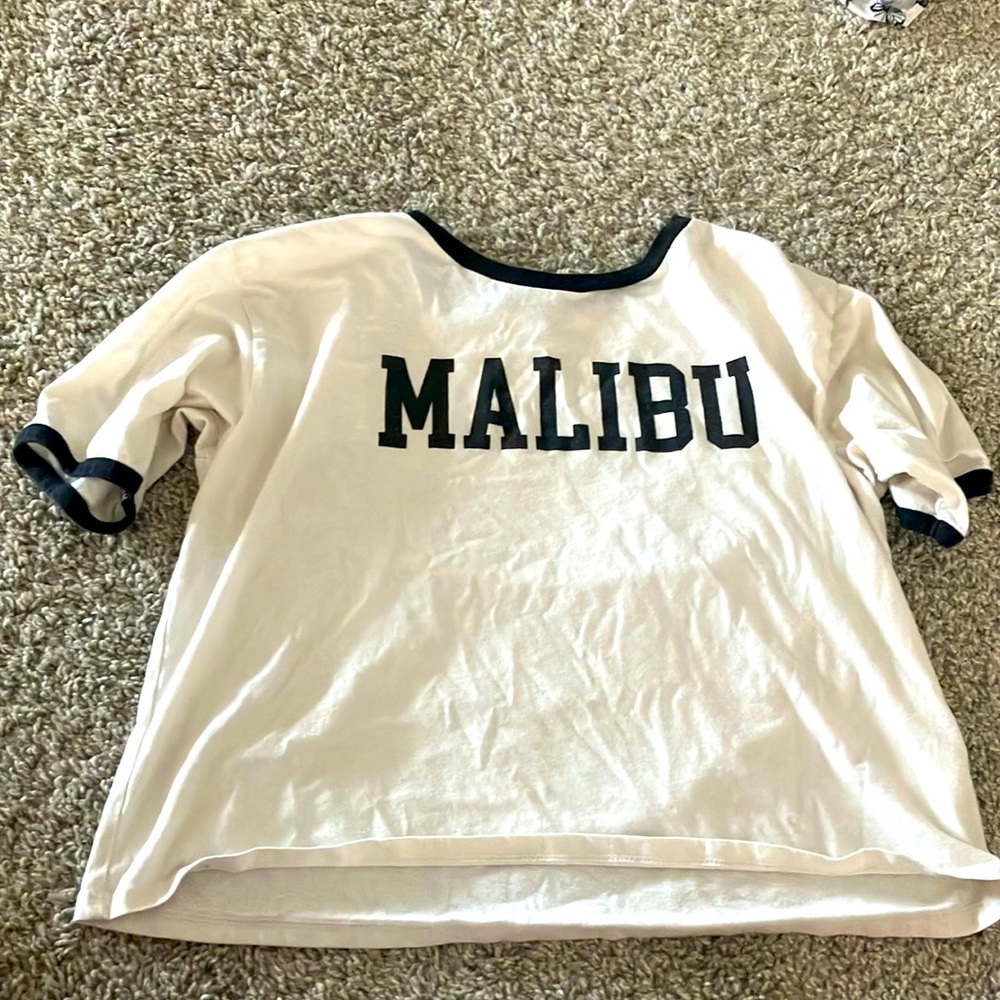 2 Youth XL cute beach’s shirts! Worn but only a few times. Very good condition.